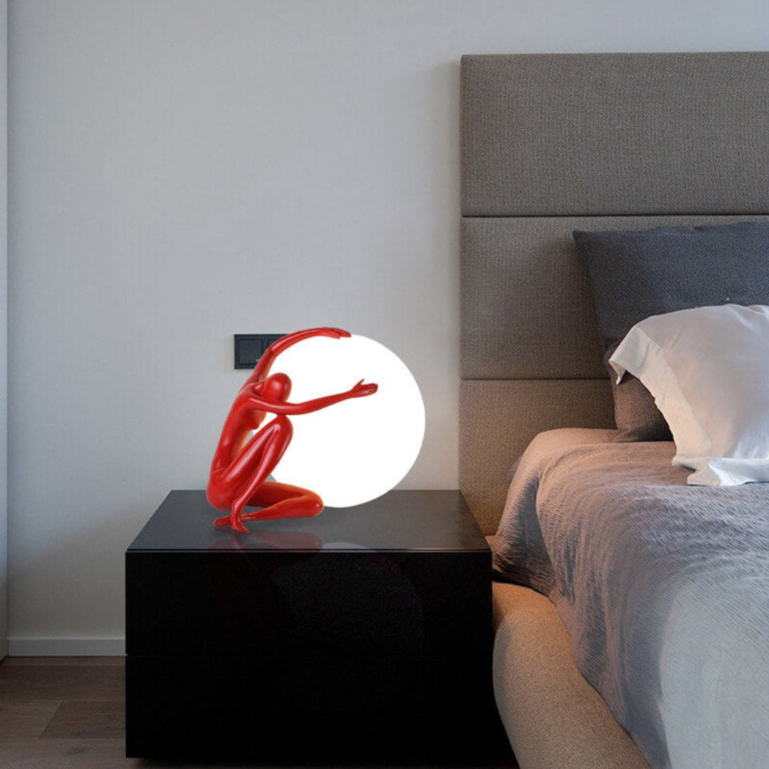 Cosmo Humanoid Ball Holding Table Lamp