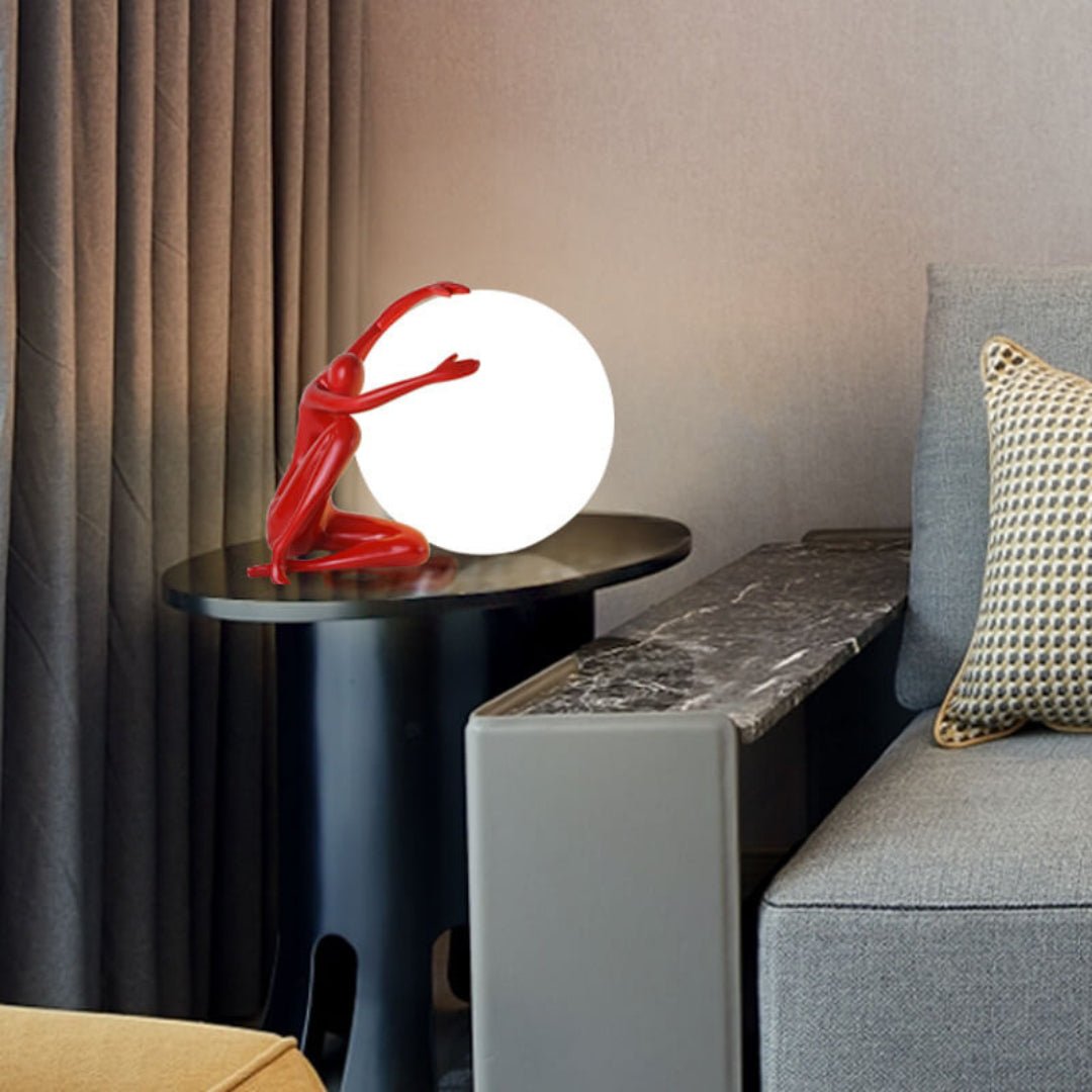 Cosmo Humanoid Ball Holding Table Lamp