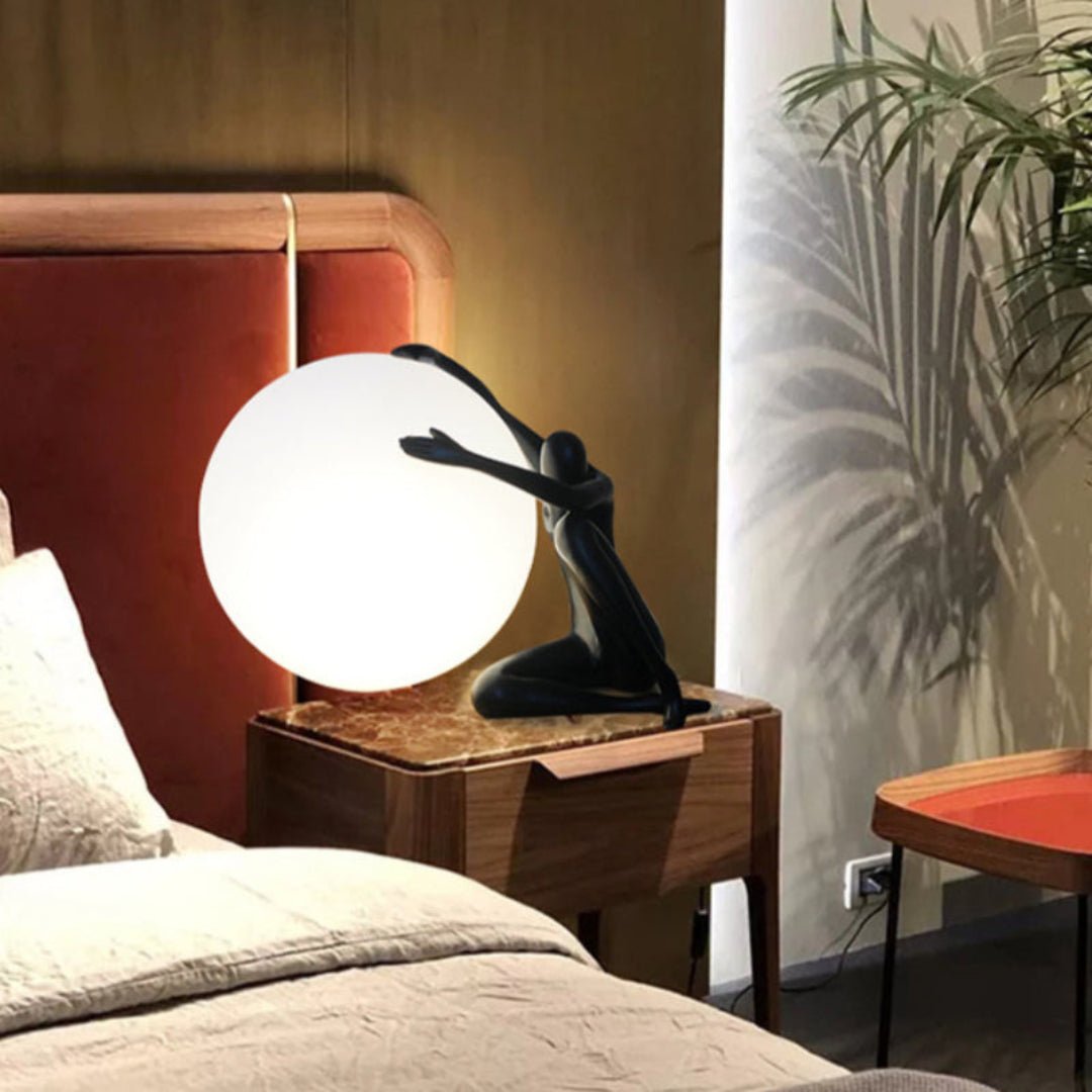 Cosmo Humanoid Ball Holding Table Lamp