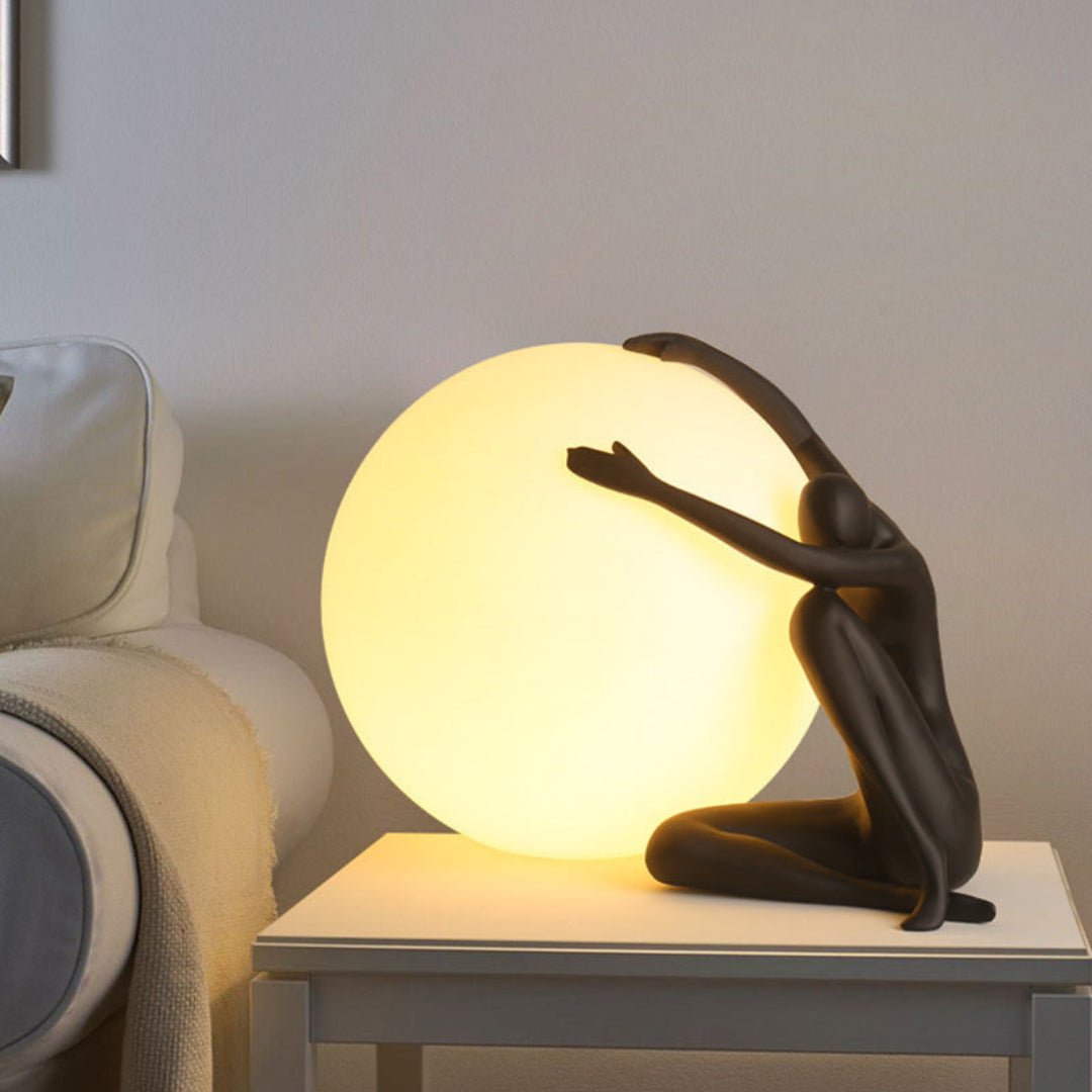 Cosmo Humanoid Ball Holding Table Lamp