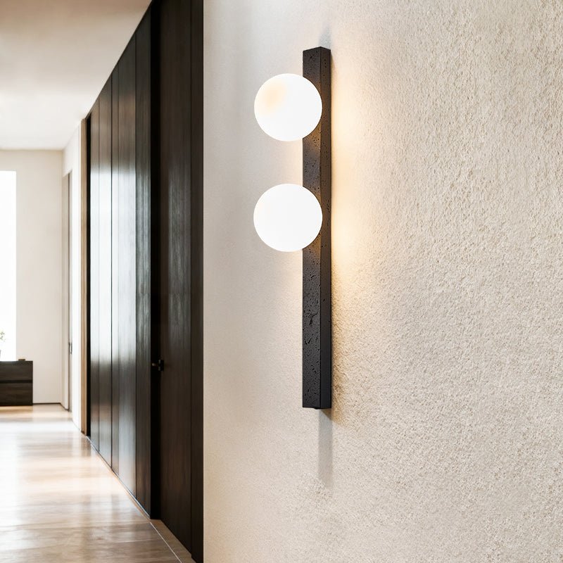 Zoshaira Globe Black Travertine Wall Sconce
