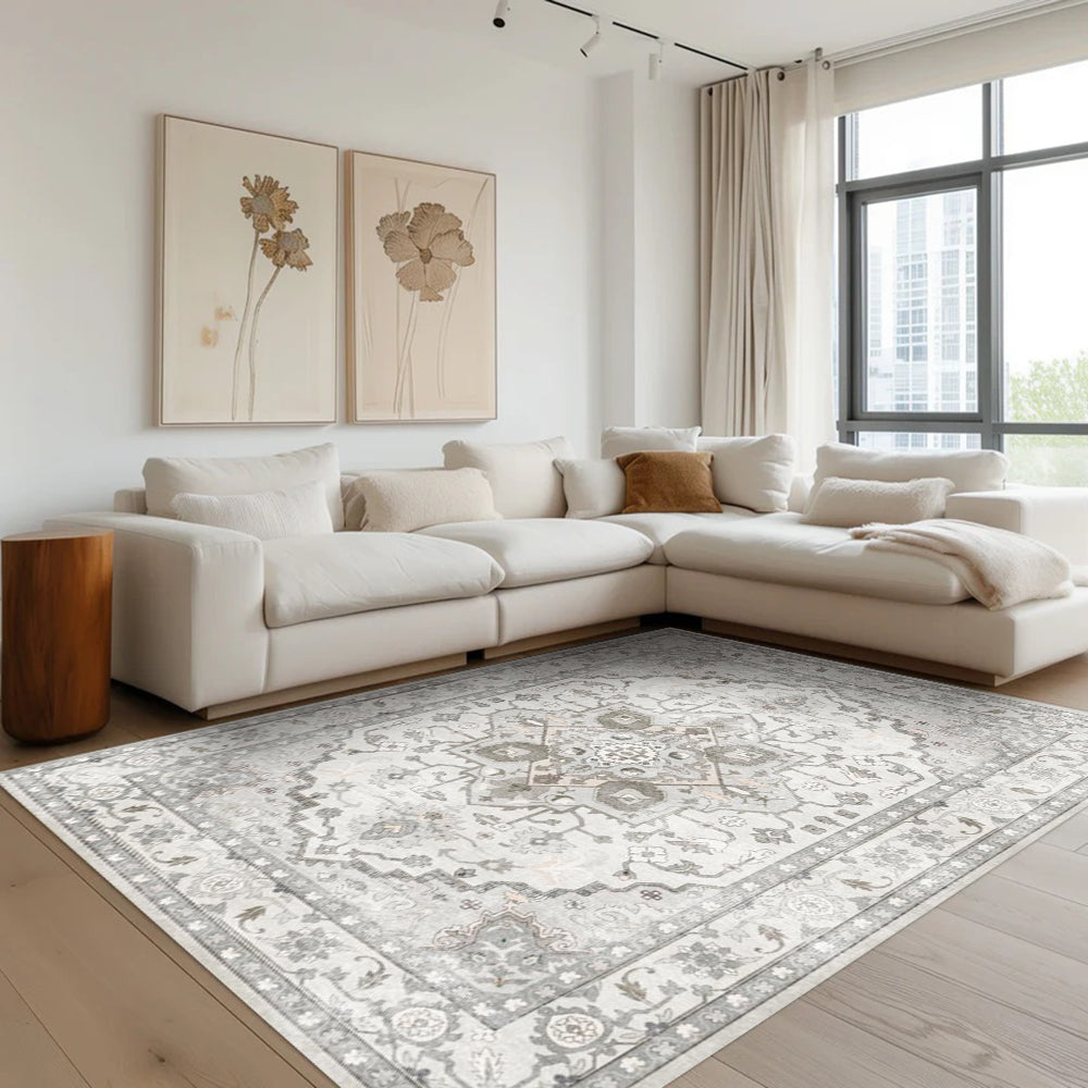 Bellerose Vintage Washable Rug in living room. Grey and off-white floral design, ideal for living spaces.