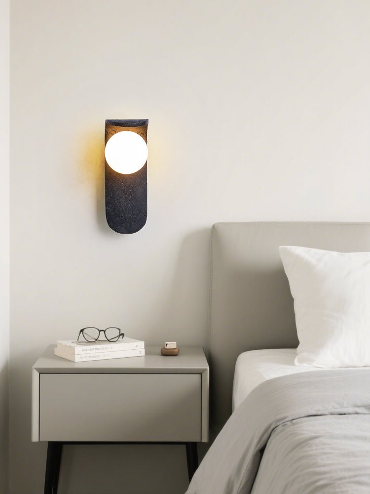 Serelora Black Travertine Orb Wall Sconce
