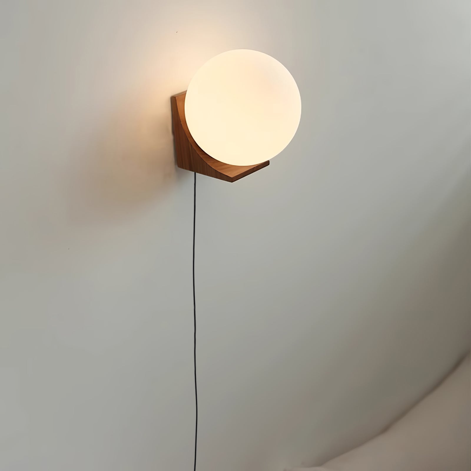 Eamon Evelyn Orb Plug-in Wall Lamp