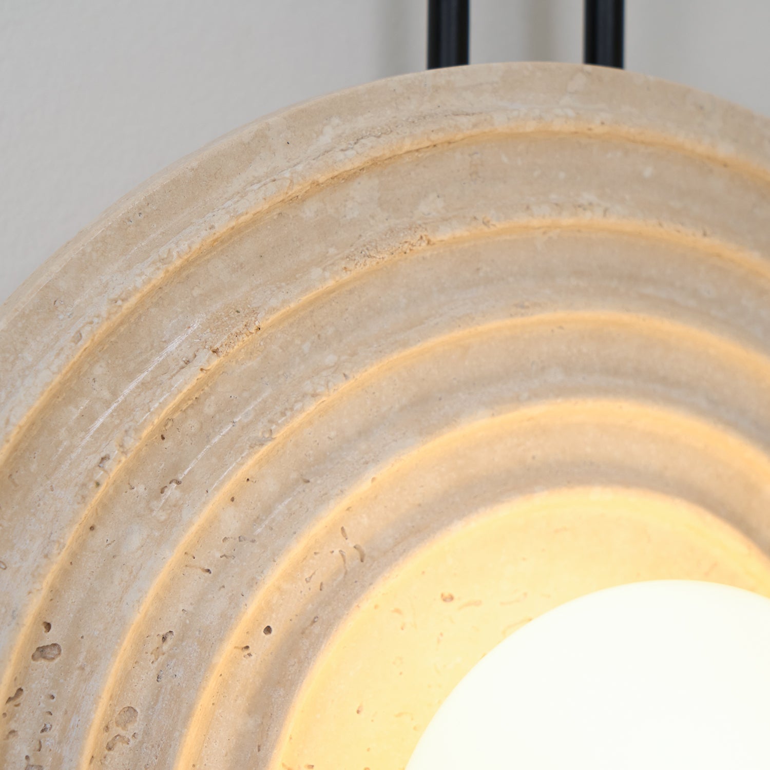 Isoror Spiral-Ring Travertine Wall Light