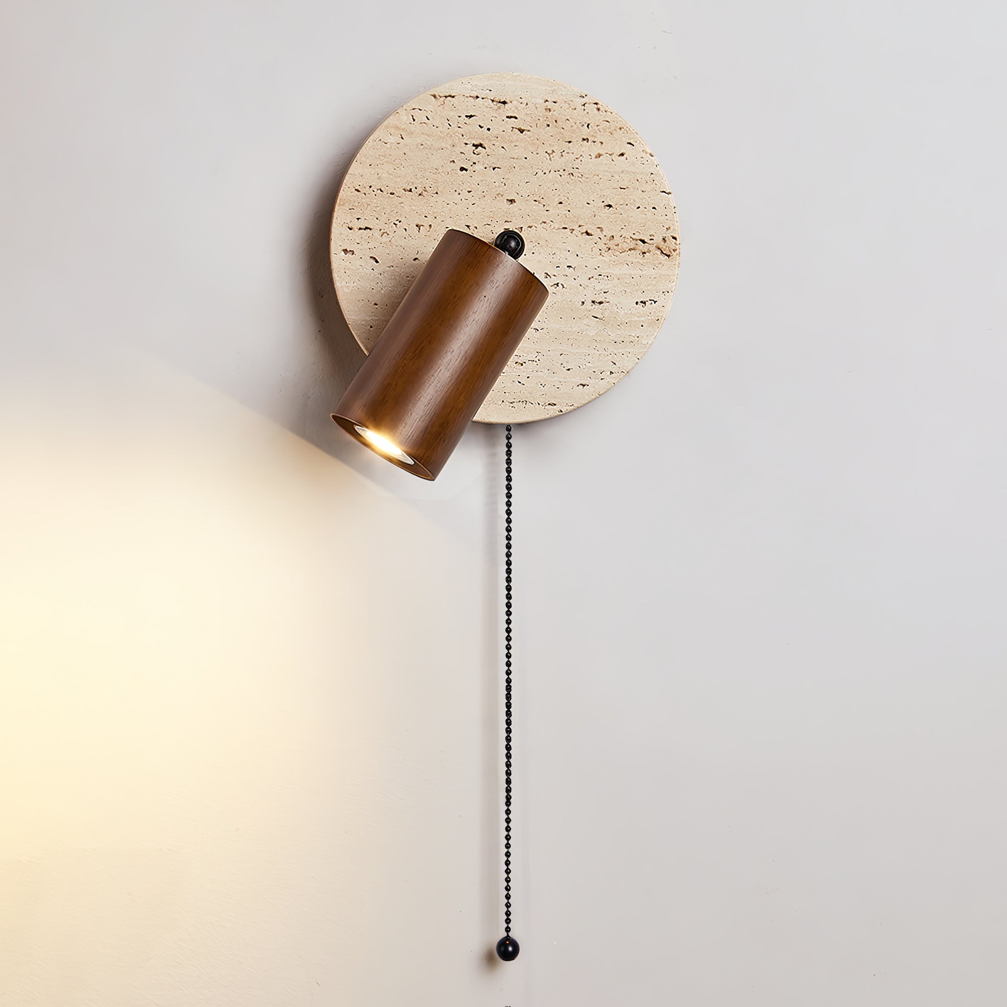Romino Disc Swing Travertine Wall Light