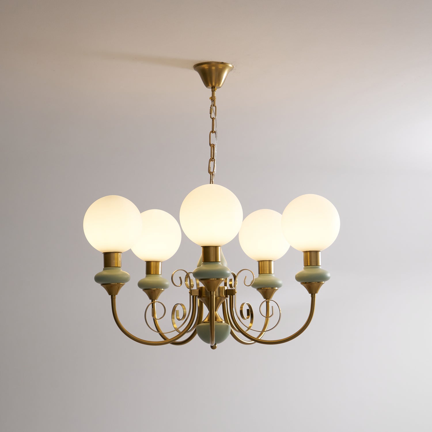 Aurorian Chandelier Green Shades Gold Curved Arms