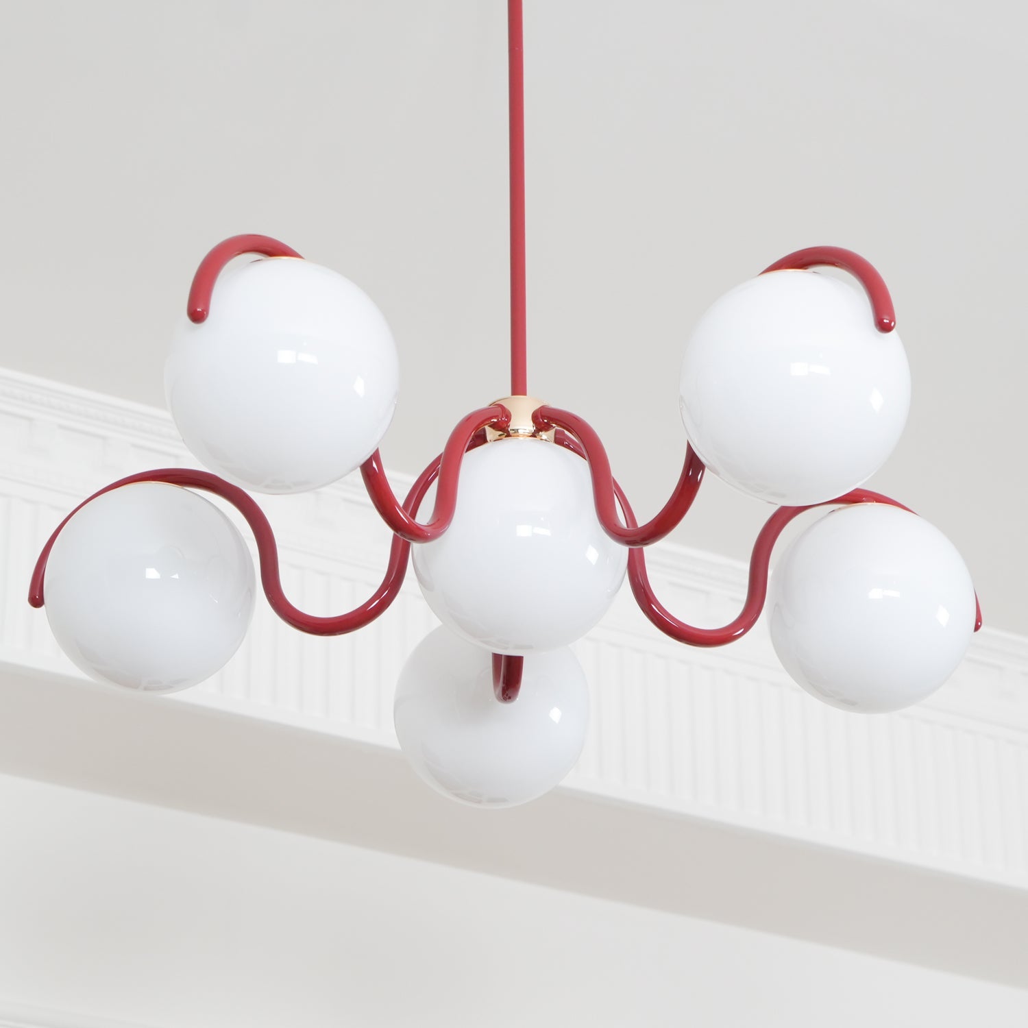 Eireine Chandelier White Glass Globes Curved Frame