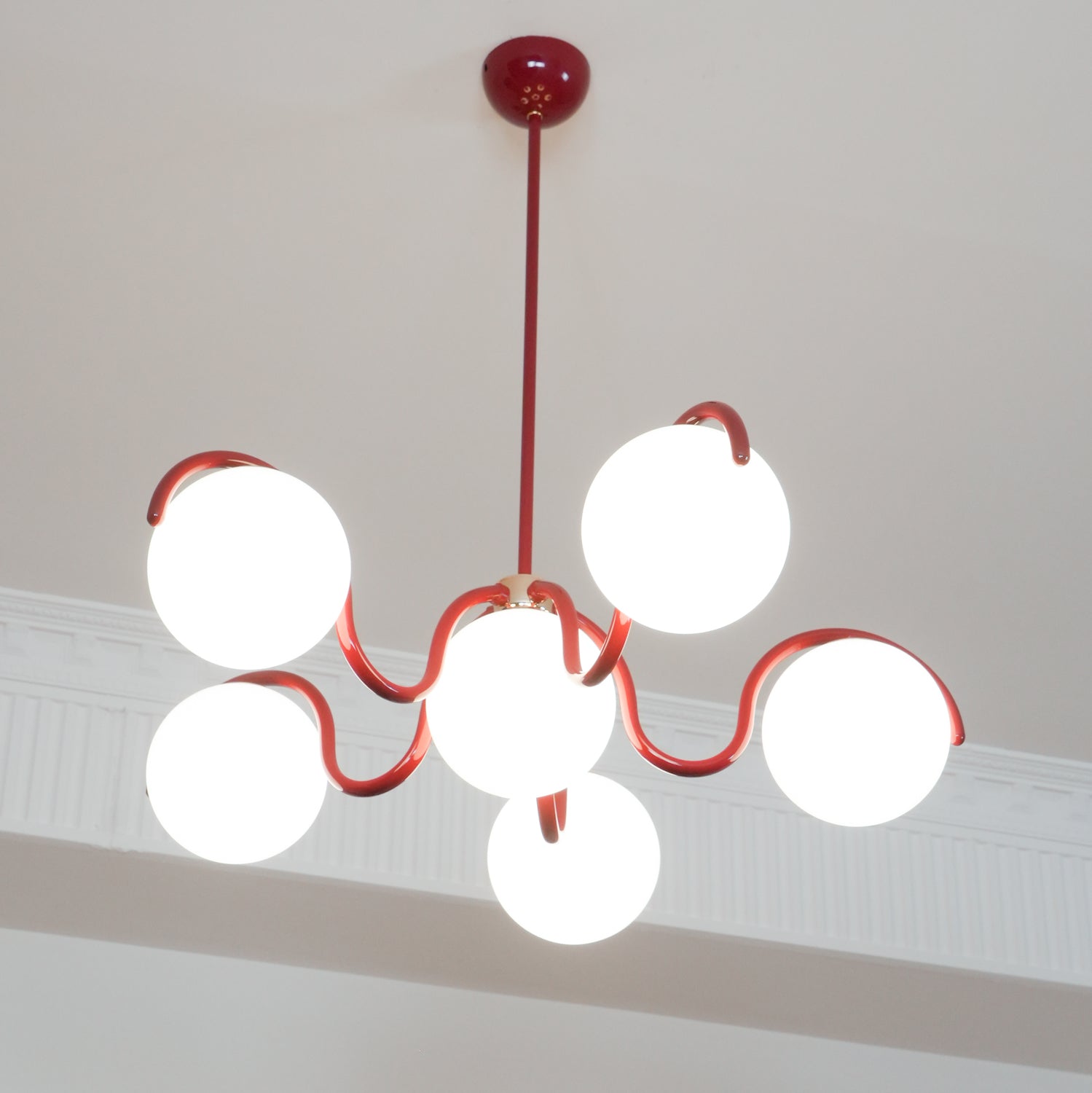 Eireine Chandelier White Glass Globes Curved Frame