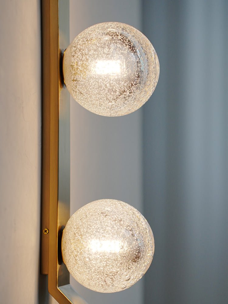 Teriivelle Vertical Orb Wall Sconce