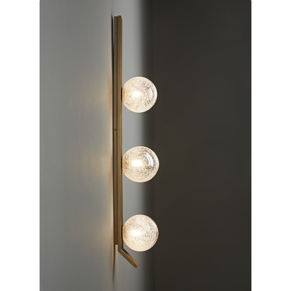 Teriivelle Vertical Orb Wall Sconce