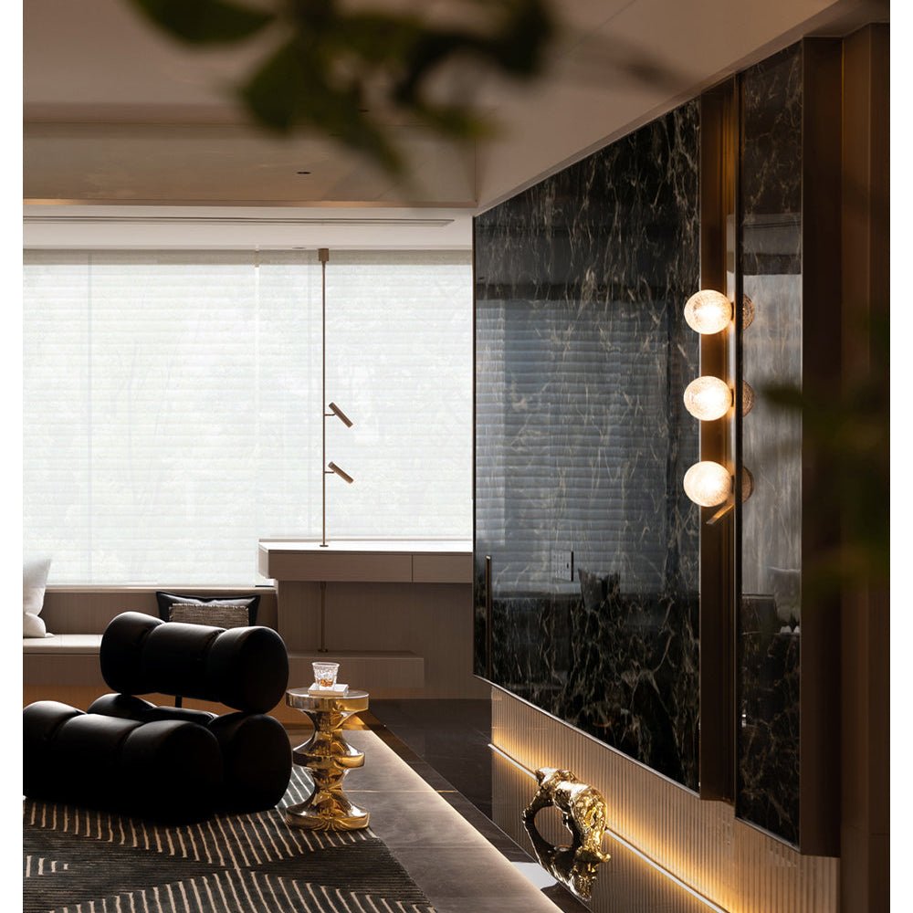 Teriivelle Vertical Orb Wall Sconce