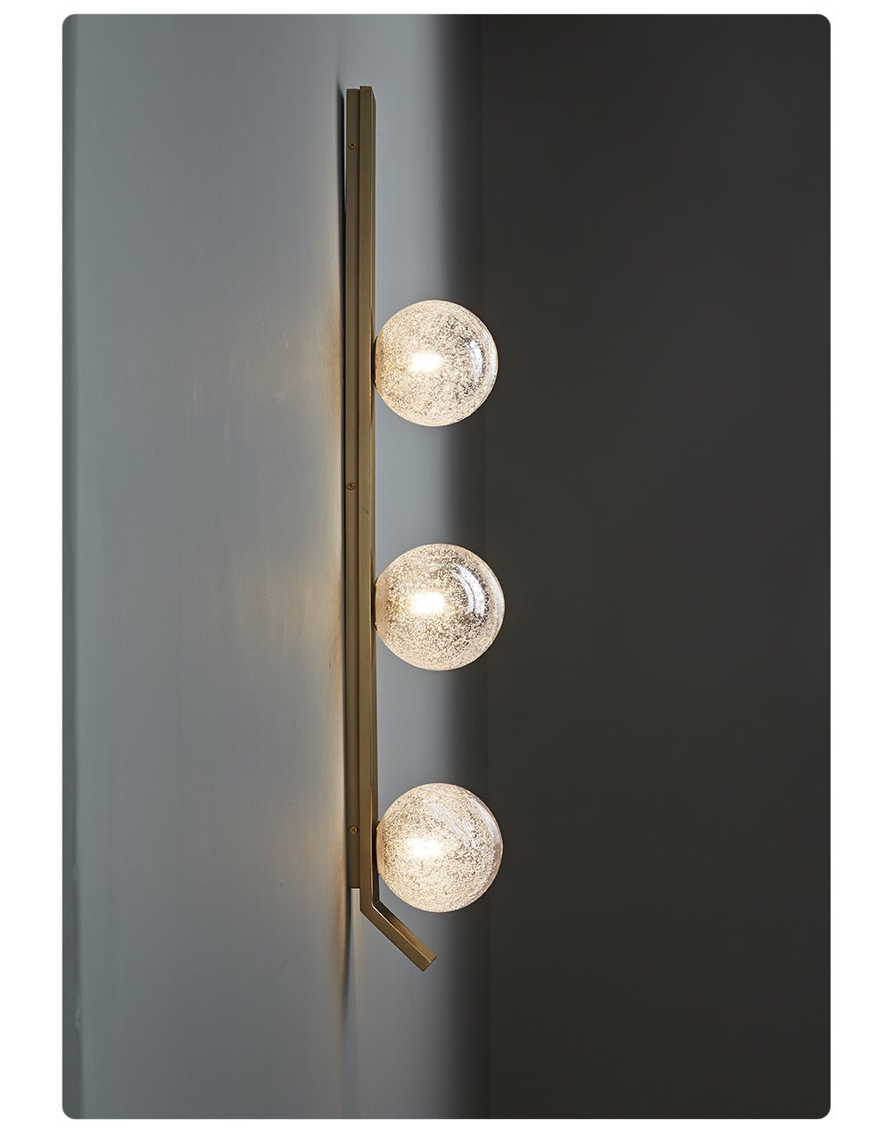 Teriivelle Vertical Orb Wall Sconce
