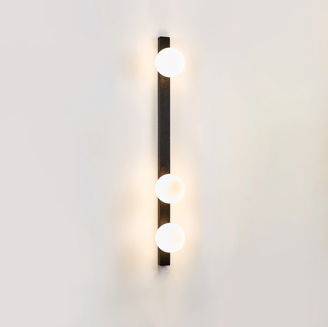 Zoshaira Globe Black Travertine  Wall Sconce