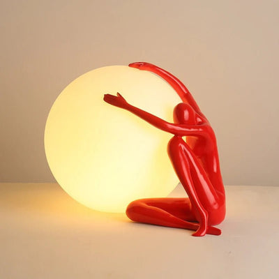 Cosmo Humanoid Ball Holding Table Lamp