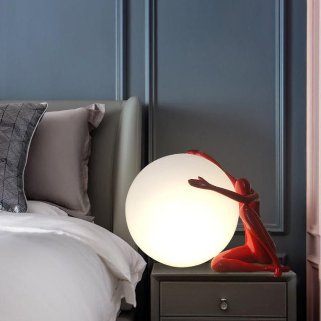 Cosmo Humanoid Ball Holding Table Lamp