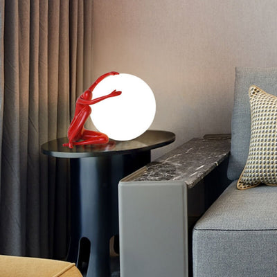 Cosmo Humanoid Ball Holding Table Lamp