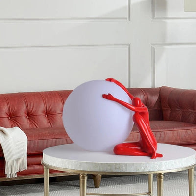 Cosmo Humanoid Ball Holding Table Lamp