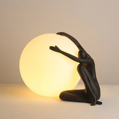 Cosmo Humanoid Ball Holding Table Lamp