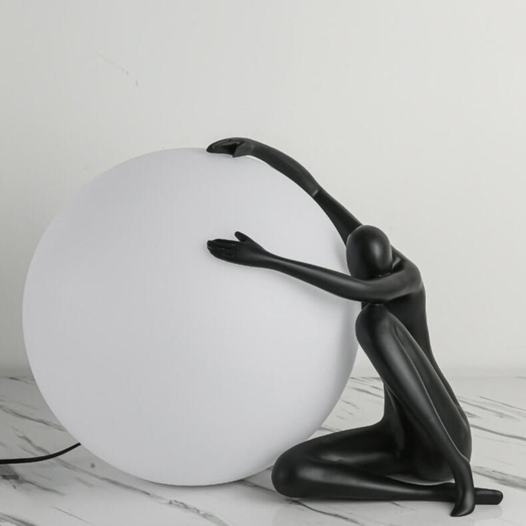 Cosmo Humanoid Ball Holding Table Lamp