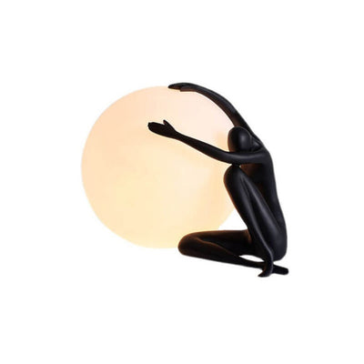 Cosmo Humanoid Ball Holding Table Lamp