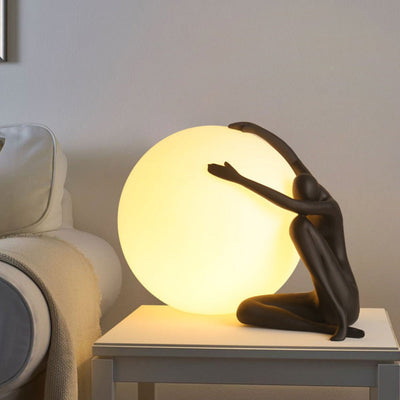 Cosmo Humanoid Ball Holding Table Lamp