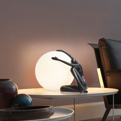 Cosmo Humanoid Ball Holding Table Lamp