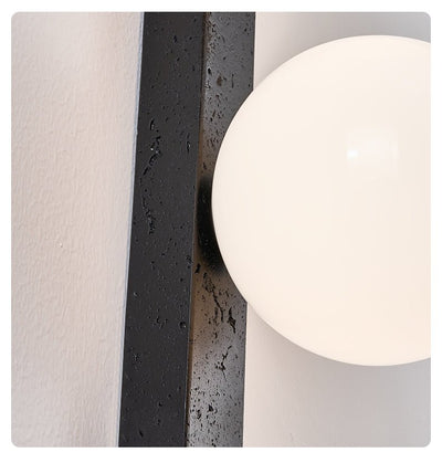 Zoshaira Globe Black Travertine  Wall Sconce
