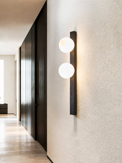 Zoshaira Globe Black Travertine  Wall Sconce