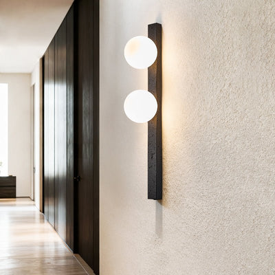 Zoshaira Globe Black Travertine  Wall Sconce