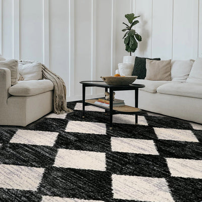 Thelonius Checkered Washable Rug, black and white pattern, 100% Polyester, living room setting, machine washable.