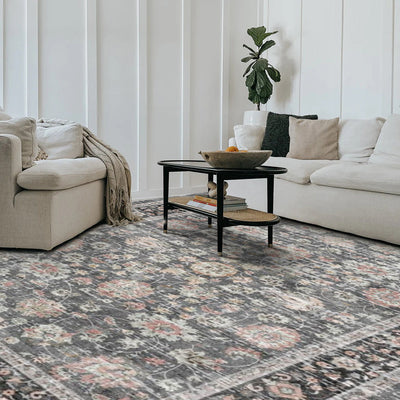 Eclipse Persian washable rug in living room, gray floral design with pink accents, polyester, machine washable area rug.
