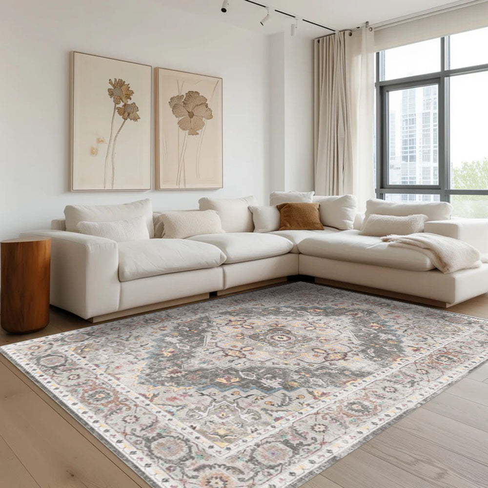 Silverstone Persian washable rug in a modern living room setting, grey and beige tones with intricate patterns.