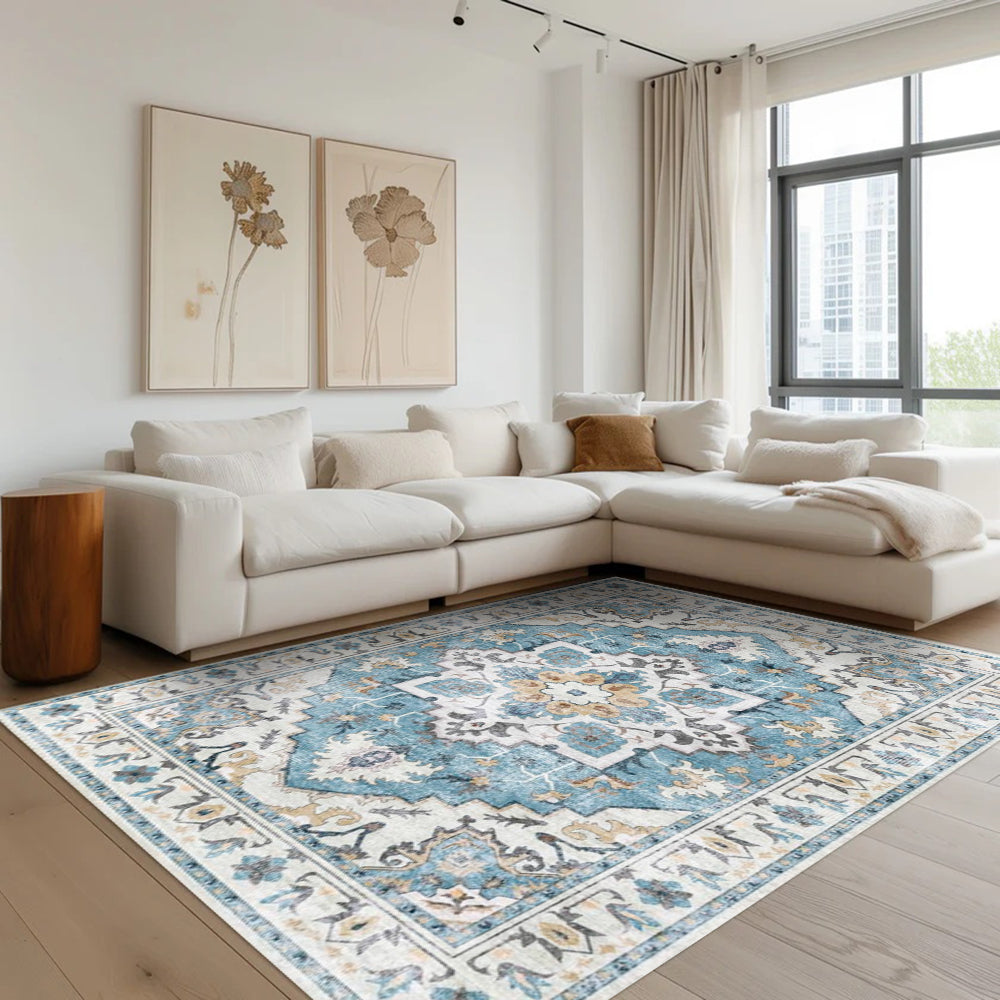 Bluebell Persian washable rug in a living room setting, featuring a blue and cream medallion design.