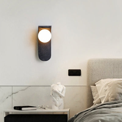 Serelora Black Travertine Orb Wall Sconce
