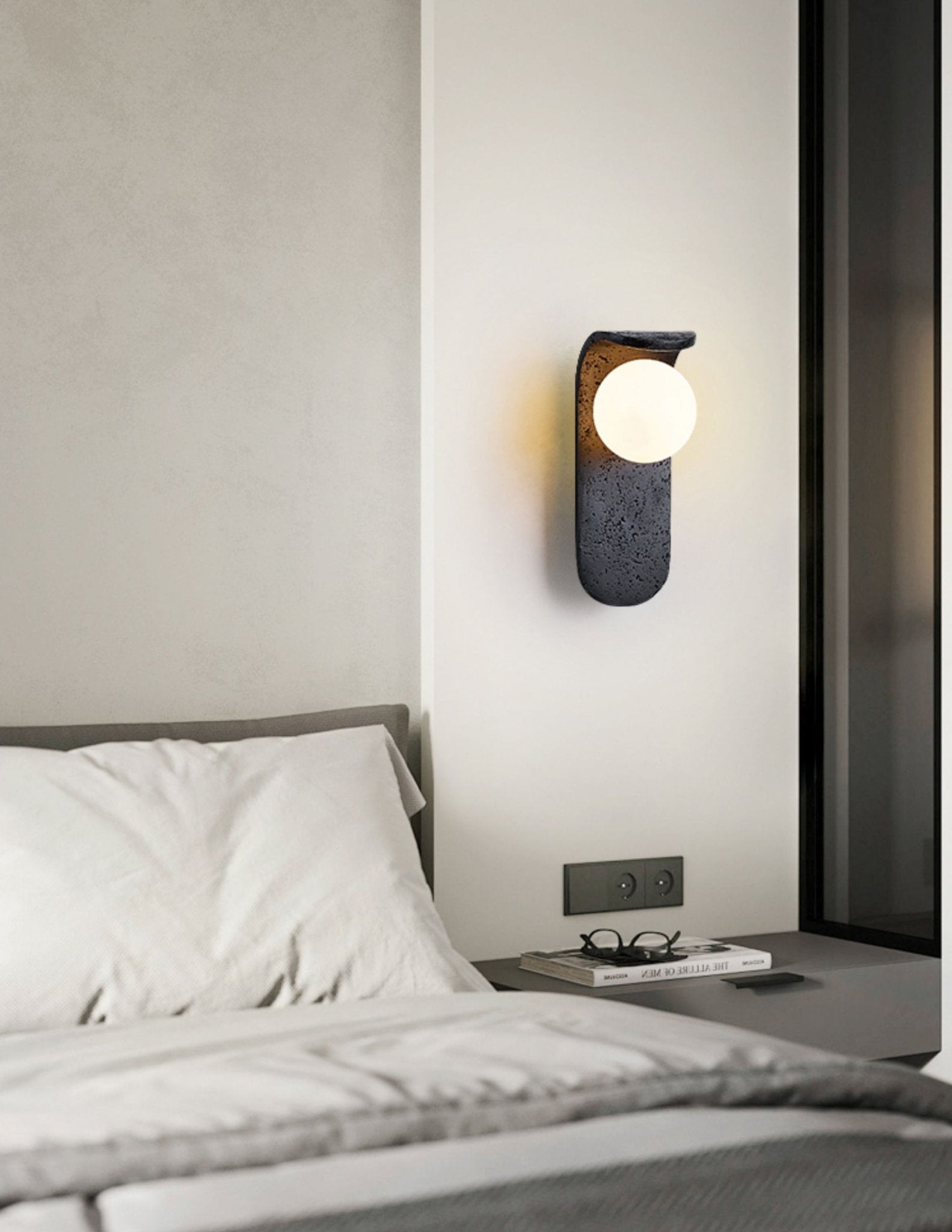 Serelora Black Travertine Orb Wall Sconce