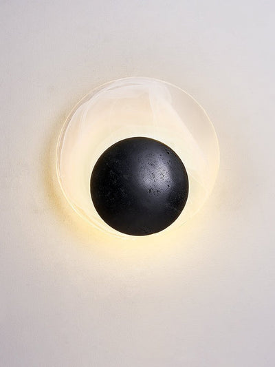 Orla Cosmica Eclipse Black Travertine Shell Wall Lamp