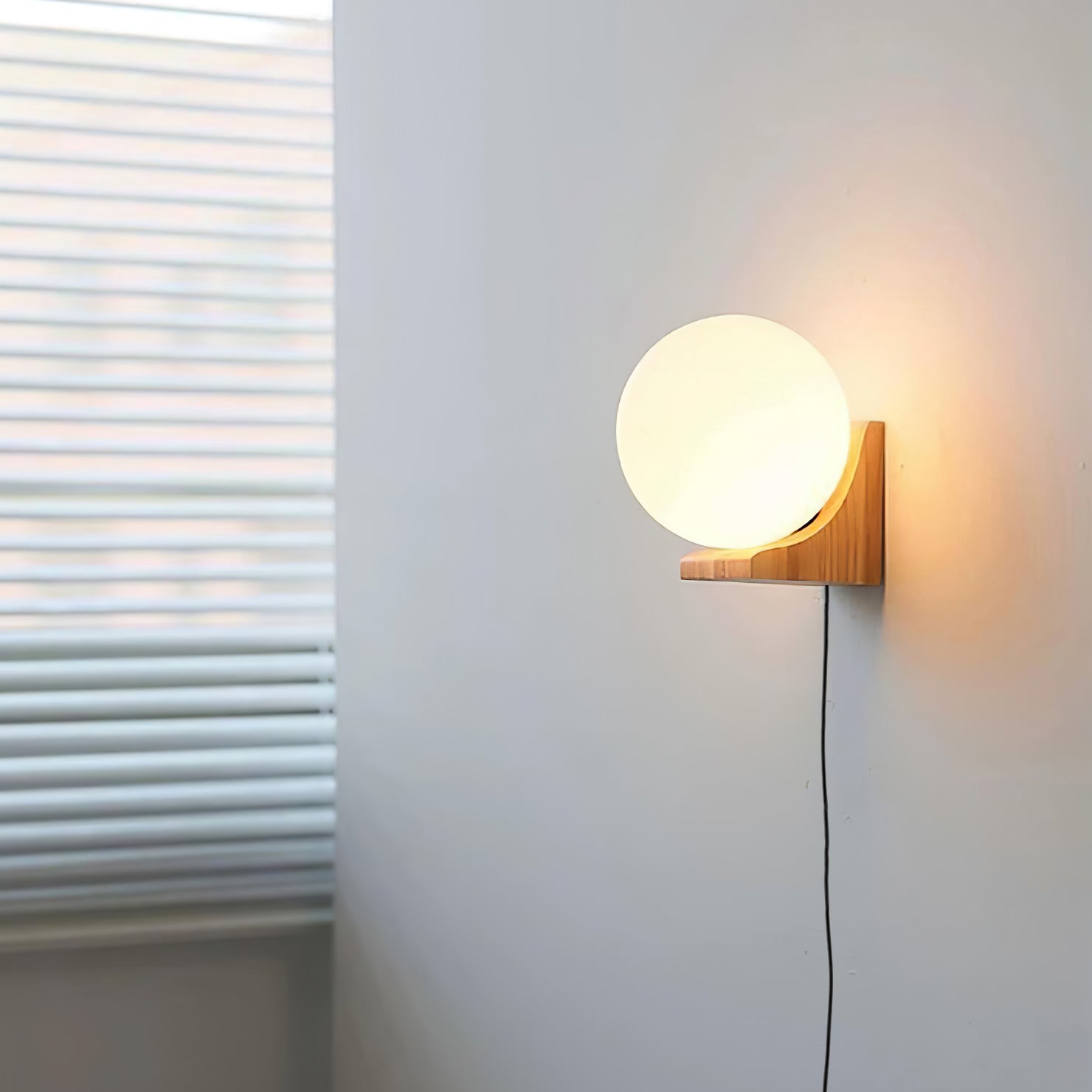 Eamon Evelyn Orb Plug-in Wall Lamp