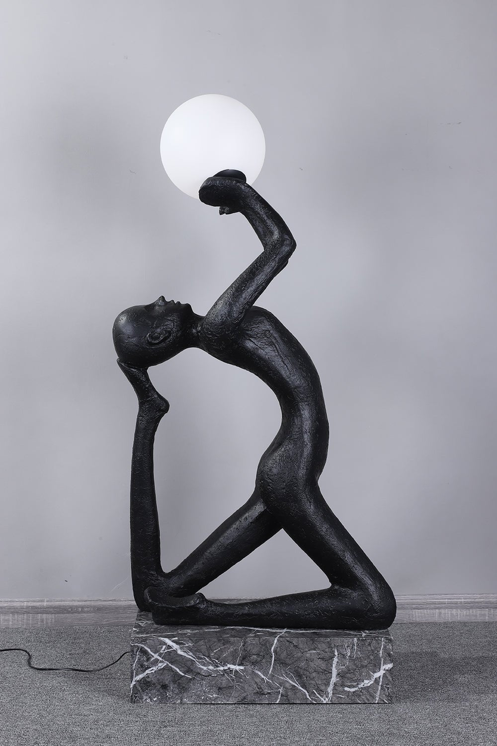 Evvinyra Contorted Black Floor Lamp