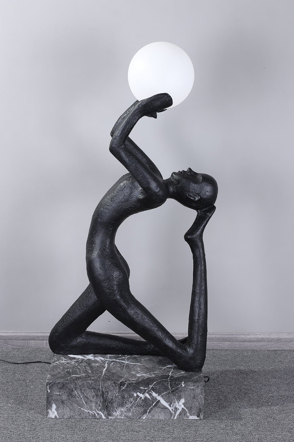 Evvinyra Contorted Black Floor Lamp