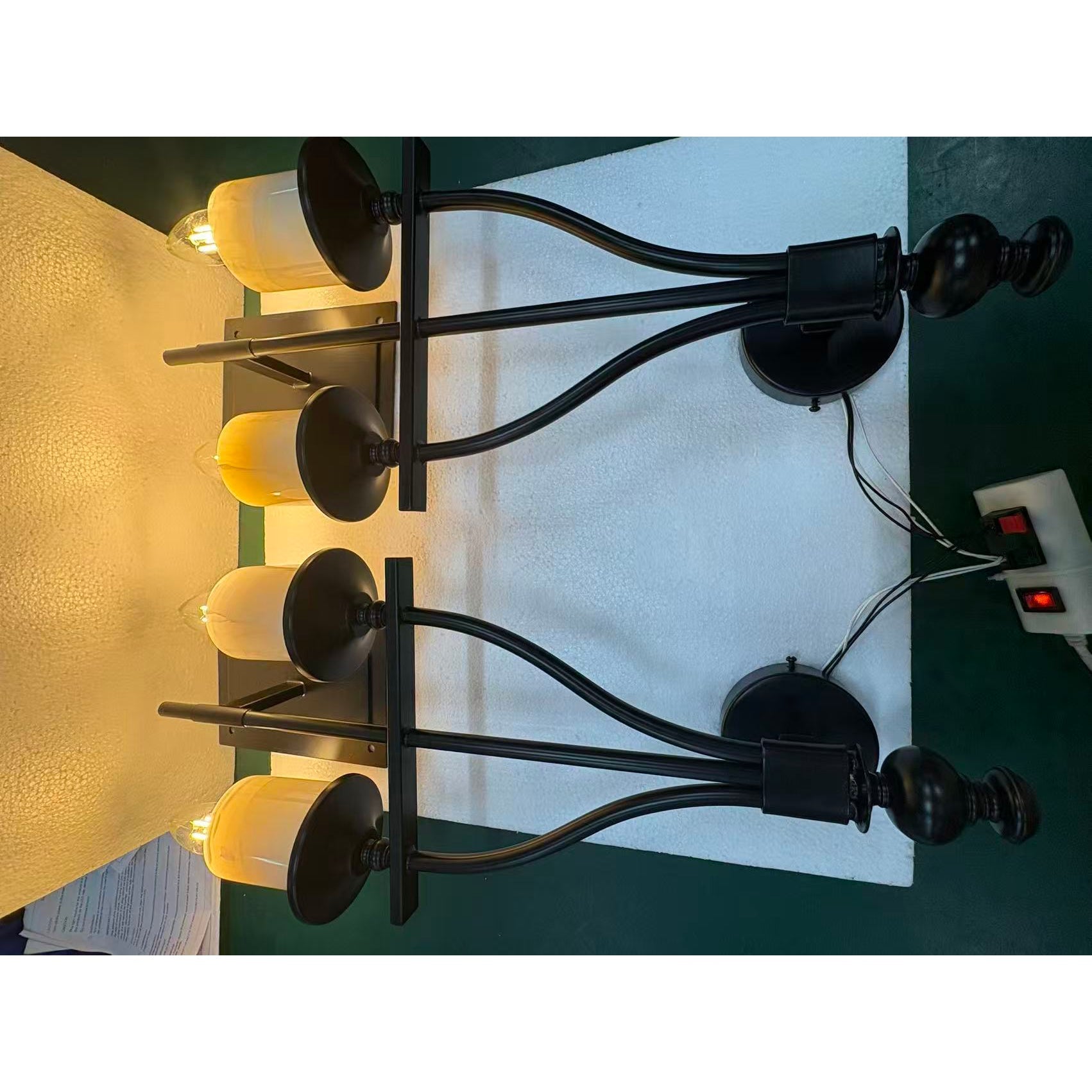 The Sienna Sconce configured with a glass lampshade.