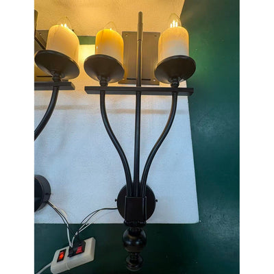 Backplate and mounting hardware of the Sienna Wall Sconce.