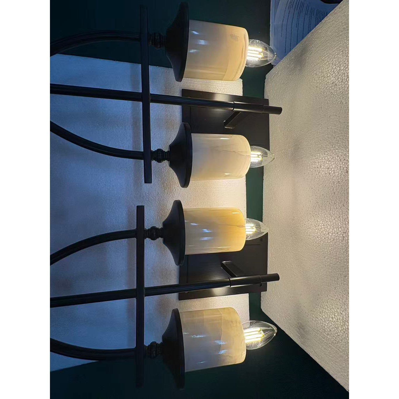 Sienna Wall Sconce shown in a minimalist interior design.