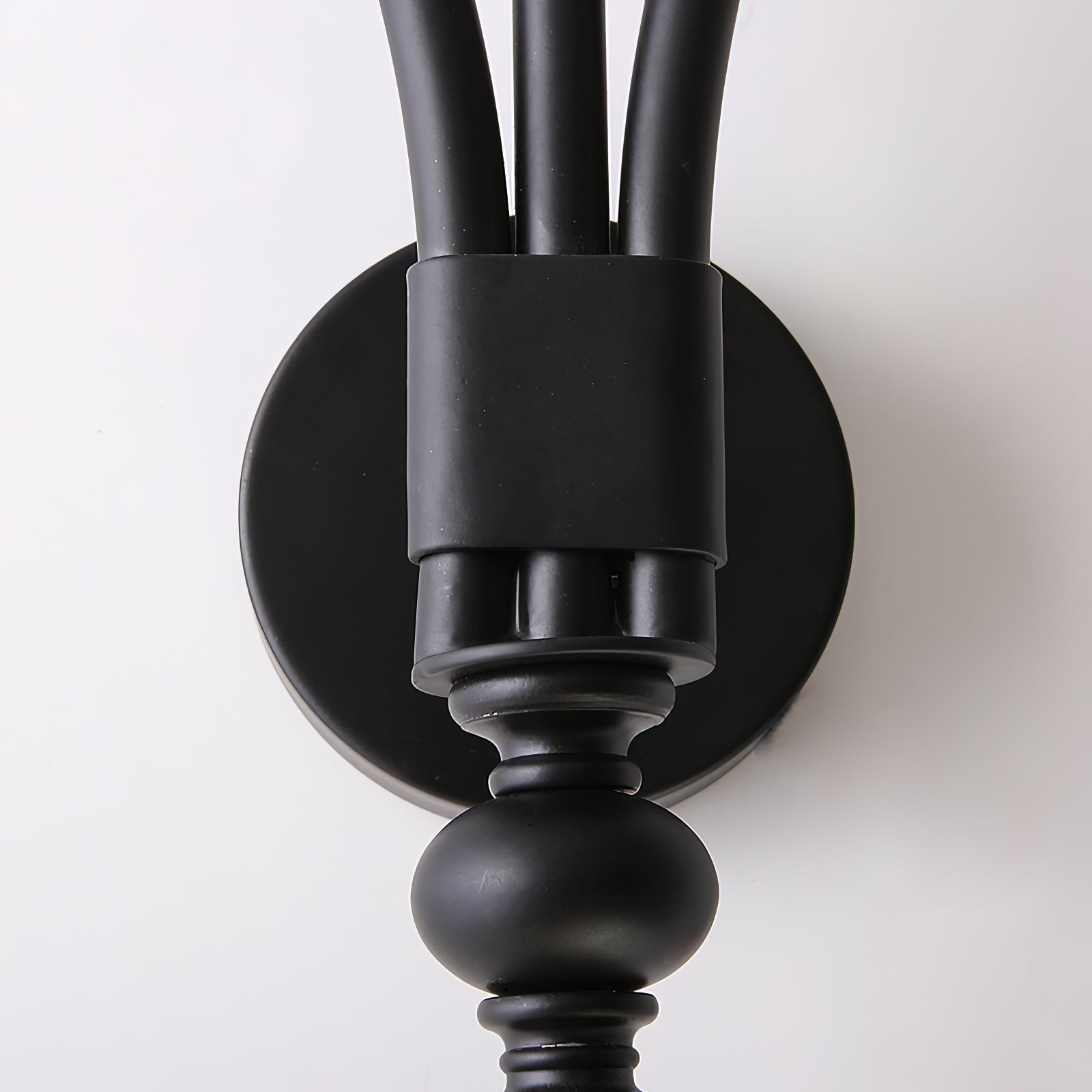 Lifestyle image of the Sienna Sconce illuminating a hallway.