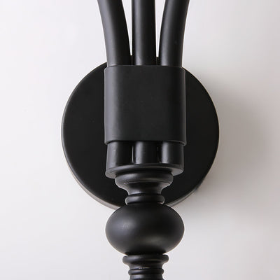Lifestyle image of the Sienna Sconce illuminating a hallway.