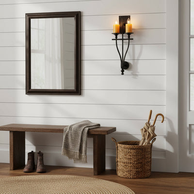 Sienna Wall Sconce in black, viewed from a low angle.
