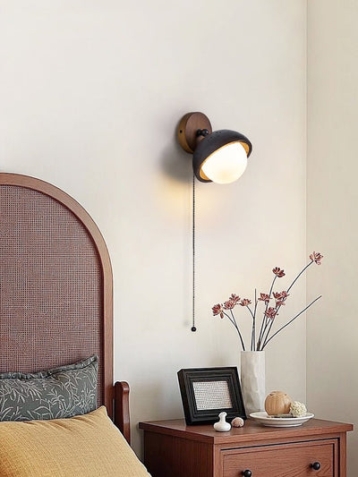 Serenaria Globe Black Travertine Pivot Sconce
