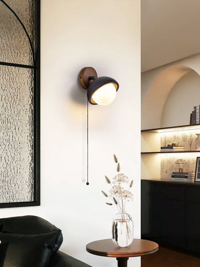 Serenaria Globe Black Travertine Pivot Sconce