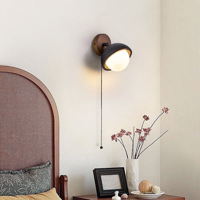Serenaria Globe Black Travertine Pivot Sconce