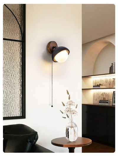 Serenaria Globe Black Travertine Pivot Sconce